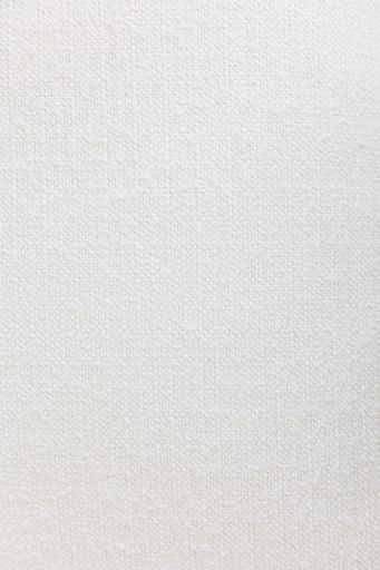 A close-up of a rough white fabric texture