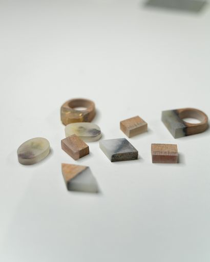 A high angle shot of wooden rings of different design on an isolated background