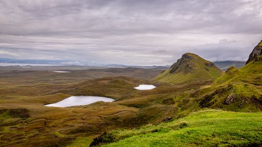 A scenic view of Quiraing, Isle of Skye on a cloudy day