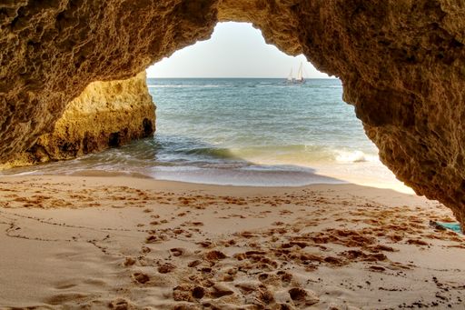 A beautiful view of a sea from a cave