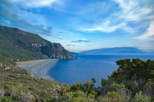 Corsica, aerial view of the Nonza beach, with black pebble, in the cap Corse