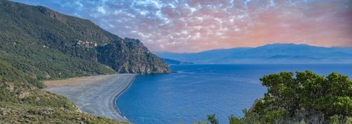 Corsica, aerial view of the Nonza beach, with black pebble, in the cap Corse