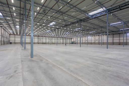 The interior of a new empty warehouse