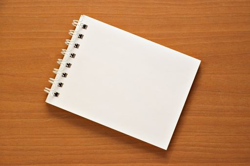 A top view of an open notepad