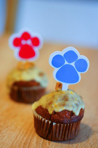 A closeup shot of homemade chocolate muffins with palm stickers on top