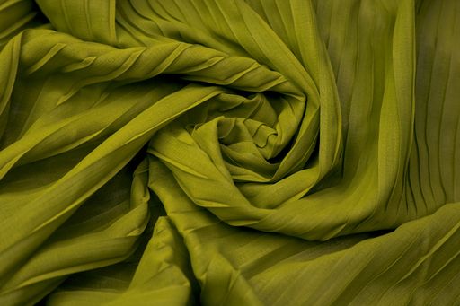 A Teal green fabric overlapping pattern on the center