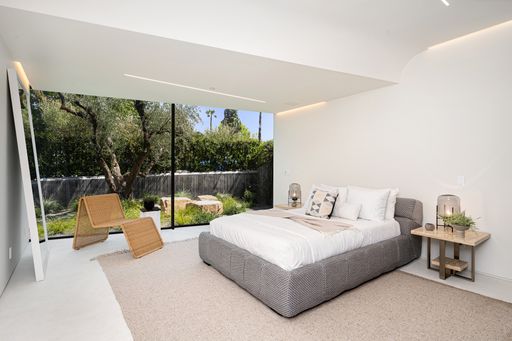 An interior shot of a bedroom of a modern house in Los Angeles