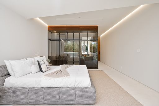 An interior shot of a bedroom of a modern house in Los Angeles
