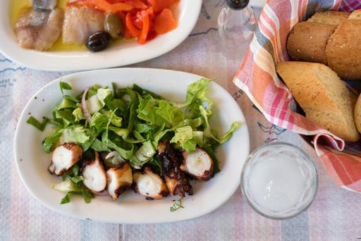 Ouzeri fish tavern , tsipouro restaurant in Volos, Greece. Taverns, bulk tsipouro good appetizers, Seafood . fish , go to Volos for tsipouro.