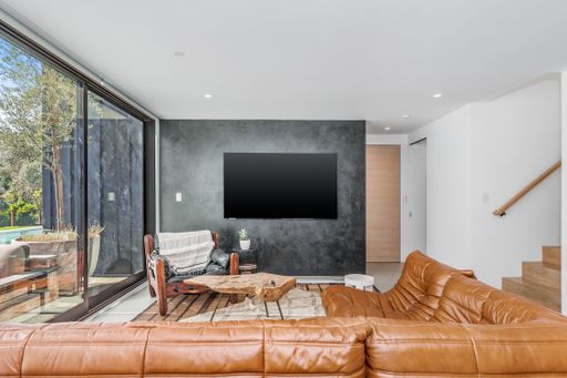 Contemporary living room with furniture and flat screen TV