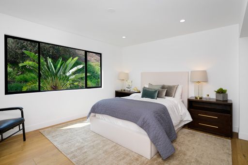 An Interior shot of a bedroom of a luxury home