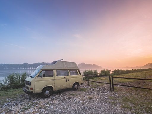 waking up relaxed in a vintage  camper van bus on the po river