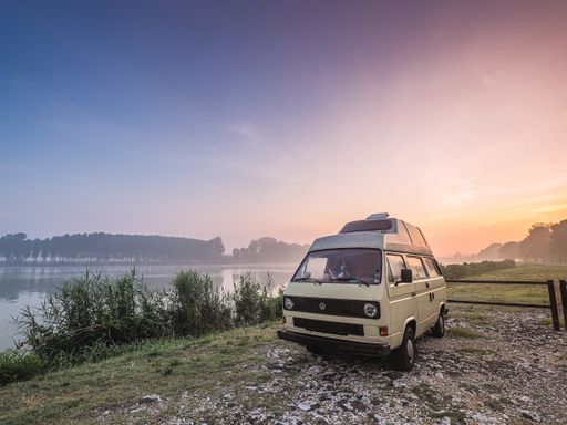 waking up relaxed in a vintage  camper van bus on the po river