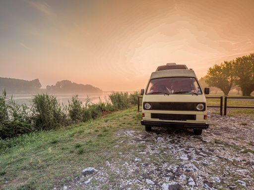 waking up relaxed in a vintage  camper van bus on the po river