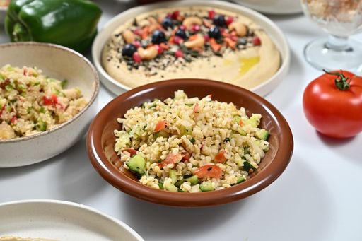Various dishes and food bowls on a table