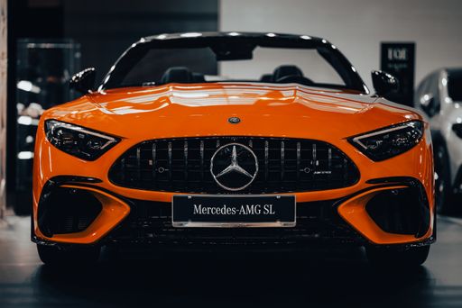 The front view of the luxury Mercedes-Benz AMG SL with blur background