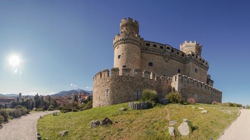 A panoramic view of Mendoza Castle in Manzanares el Real during sunset, Madrid, Spain.