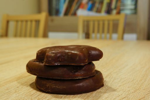 A closeup shot of chocolate biscuits on a wooden surface