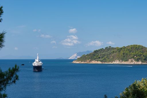 the luxury boat of the Sheikh of Qatar, at Koukounaries beach, Skiathos, Greece. The luxury yacht "Al Mirqab" is 133 meters long