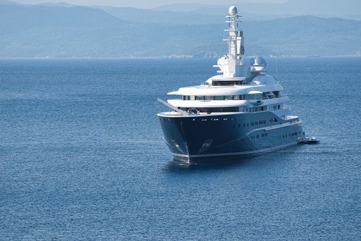 the luxury boat of the Sheikh of Qatar, at Koukounaries beach, Skiathos, Greece. The luxury yacht "Al Mirqab" is 133 meters long
