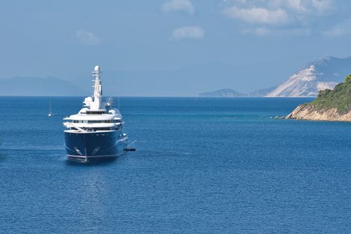 the luxury boat of the Sheikh of Qatar, at Koukounaries beach, Skiathos, Greece. The luxury yacht "Al Mirqab" is 133 meters long