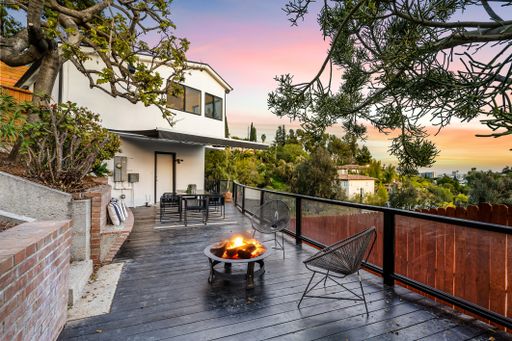 A modern Hollywood Hills home balcony in Los Angeles, California, with a remodel of an older house