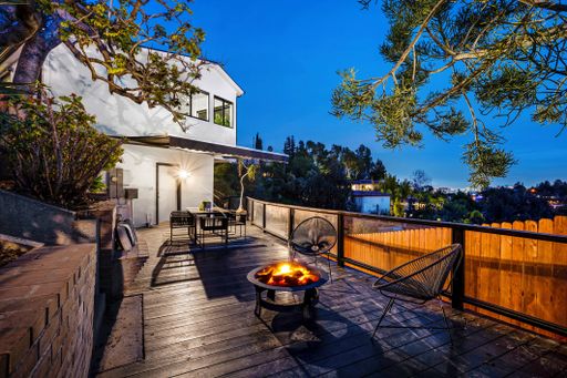 A modern Hollywood Hills home balcony in Los Angeles, California, with a remodel of an older house