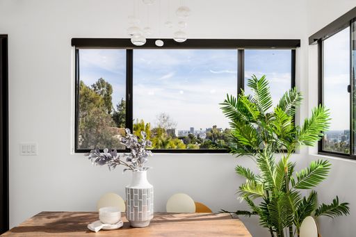 A modern Hollywood Hills home living room in Los Angeles, California, with a remodel of an older house