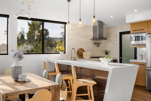A modern Hollywood Hills home kitchen in Los Angeles, California, with a remodel of an older house