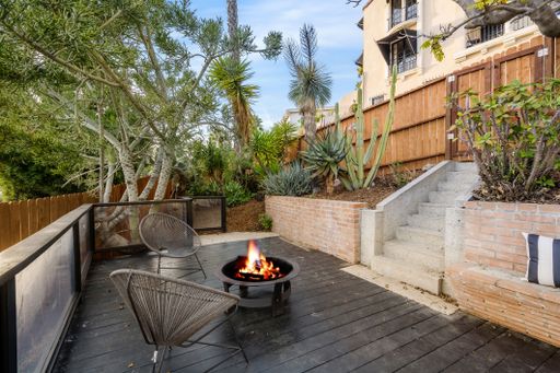 A modern Hollywood Hills home patio in Los Angeles, California, with a remodel of an older house