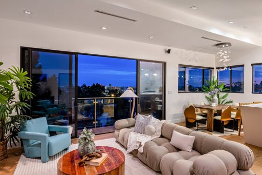 A modern Hollywood Hills home living room in Los Angeles, California, with a remodel of an older house