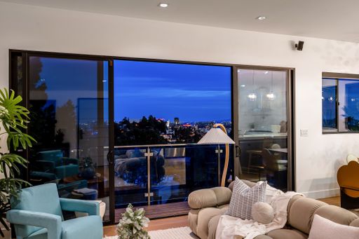 A modern Hollywood Hills home living room in Los Angeles, California, with a remodel of an older house