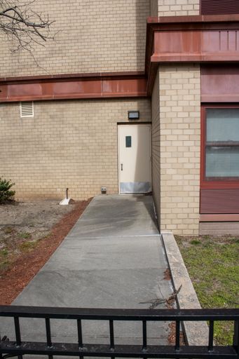 A structure with a red and beige exterior