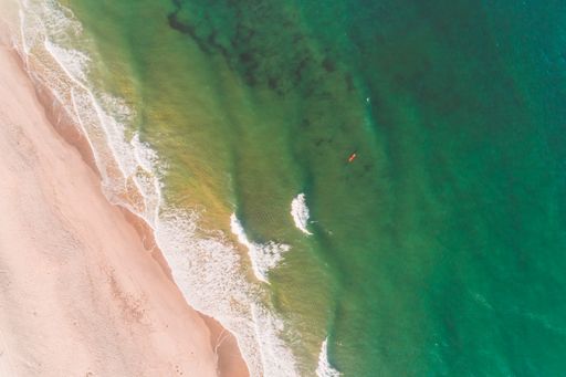 Top view aerial photo from flying drone of beautiful sea landscape with turquoise water with copy space for your text message or promotional content,
