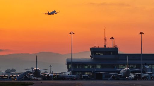 Three airplanes parked on the runway at Sofia Airport, Bulgaria