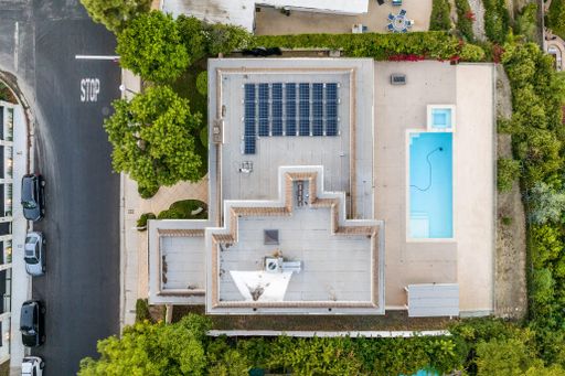 An aerial view of home's pool and garage area in Encino, California