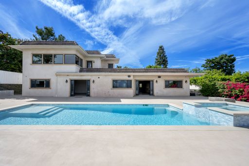 A spacious home with pool and patio beside in California
