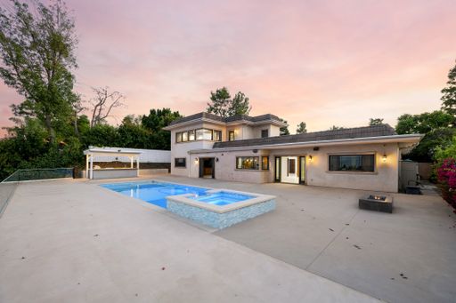 A beautiful pool and backyard of a home in California