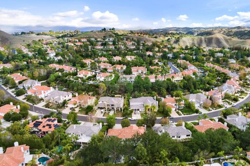 Aerial view of suburban city with houses and trees
