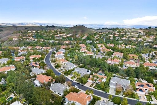 Aerial view of city residential buildings on hillside