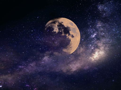 A mesmerizing view of a moon with starry sky