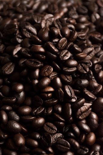 A close-up of a heap of coffee beans