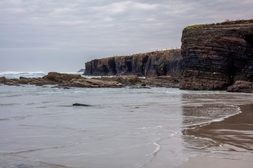 A beautiful shot of the cliffs and the ocean near the Las Catedrales Beach in Galicia, Spain