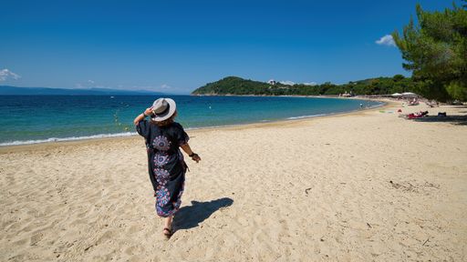Holidays in the Greek islands, summer 2021, the world famous Koukounaries beach , Skiathos island , Greece 6-13-2021