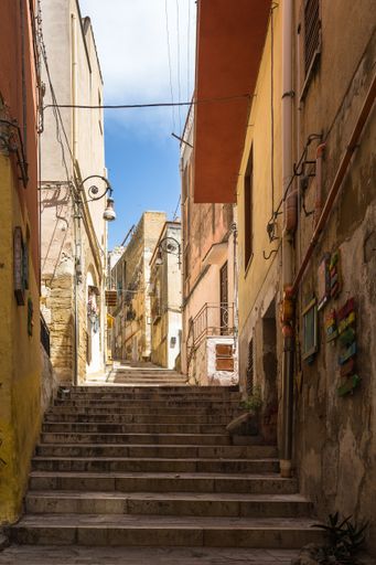 A beautiful shot of an alleyway in the old town of Sciacca, Sicily, Italy on a sunny day