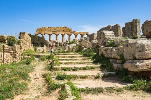 The ruins of the Temple of Apollo building in the Selinunte Archeological park in Sicily, Italy