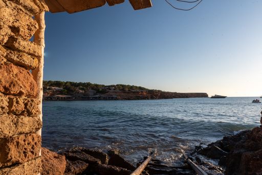 A scenic view from a fisherman's hut on the beach in Cala Saona in Formentera, Spain