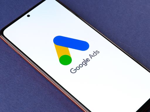 Google Ads logo on phone screen;.