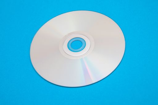 A closeup shot of an empty disc isolated on blue background