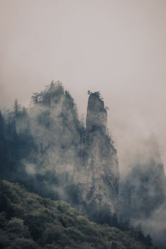 Foggy Landscape in famous Ceahlau National Park, Romania in mid June